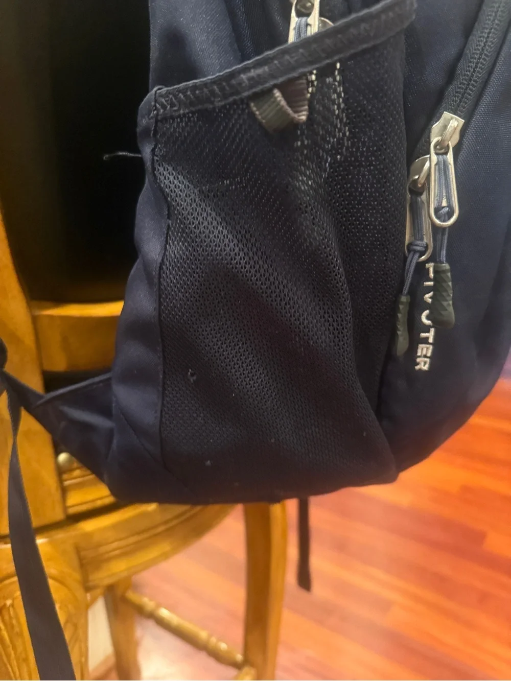 The North Face (Pivioter) Dark Blue Backpack with White Logo